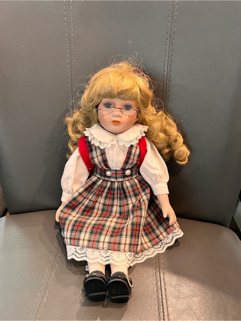 Classic Blonde Porcelain School Girl Doll with plaid dress, glasses and backpack